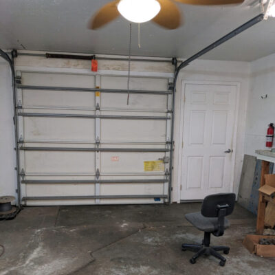 2144 Delano St. - garage door at the back of office.